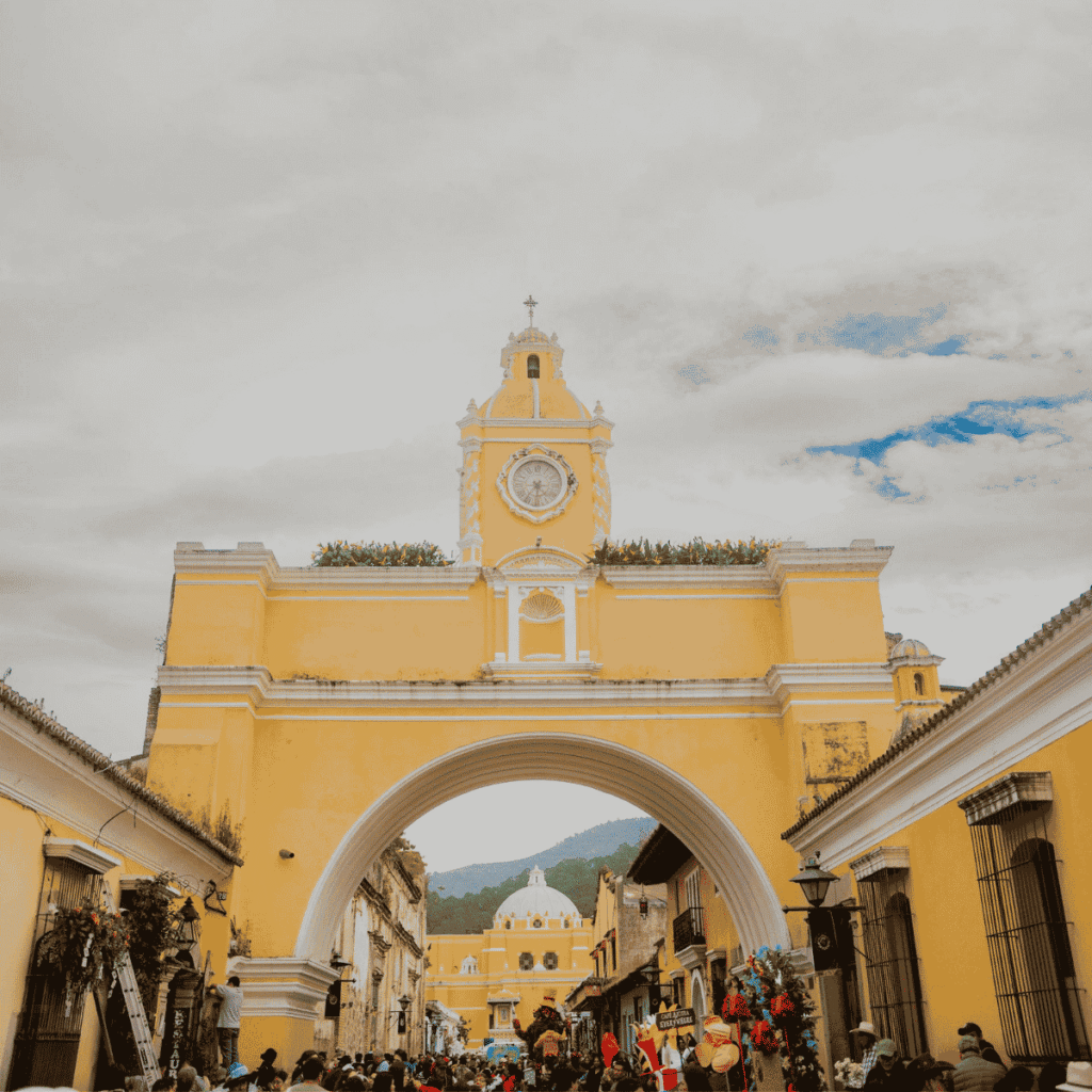 Santa Catalina Arch in Antigua Guatemala showcasing the historic atmosphere behind the Antigua vs Huehuetenango coffee comparison