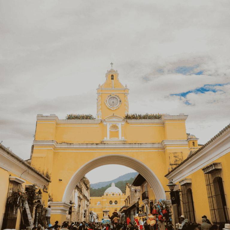 Santa Catalina Arch in Antigua Guatemala showcasing the historic atmosphere behind the Antigua vs Huehuetenango coffee comparison